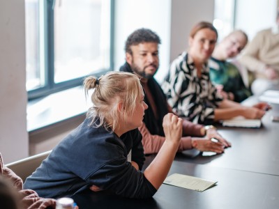 People discussing at a table