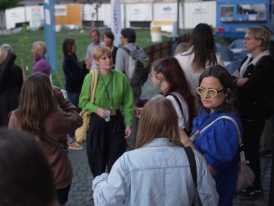 A group of people networking outdoors